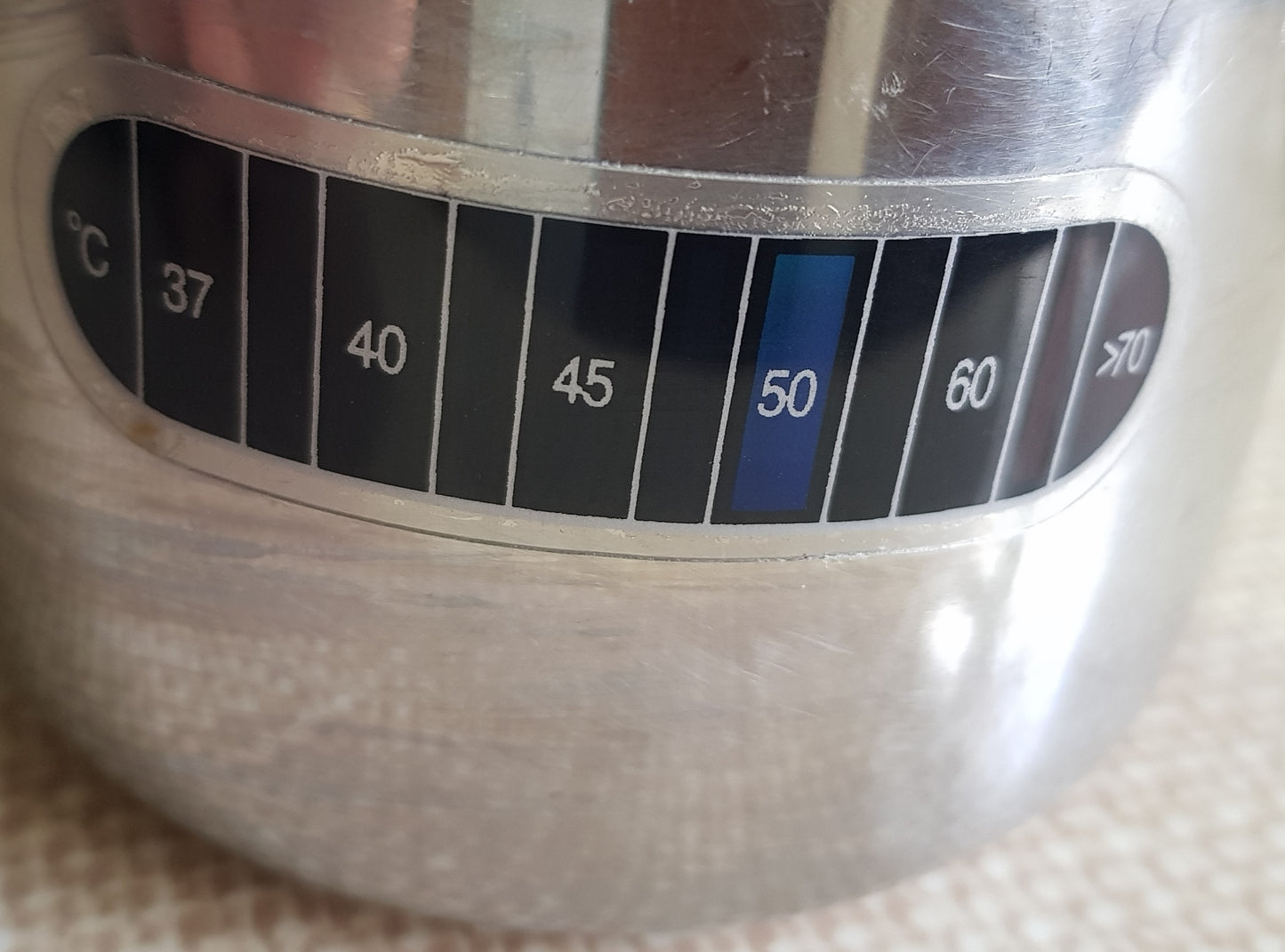 Milk frother/steamer temperature strip. Adhesive backing.